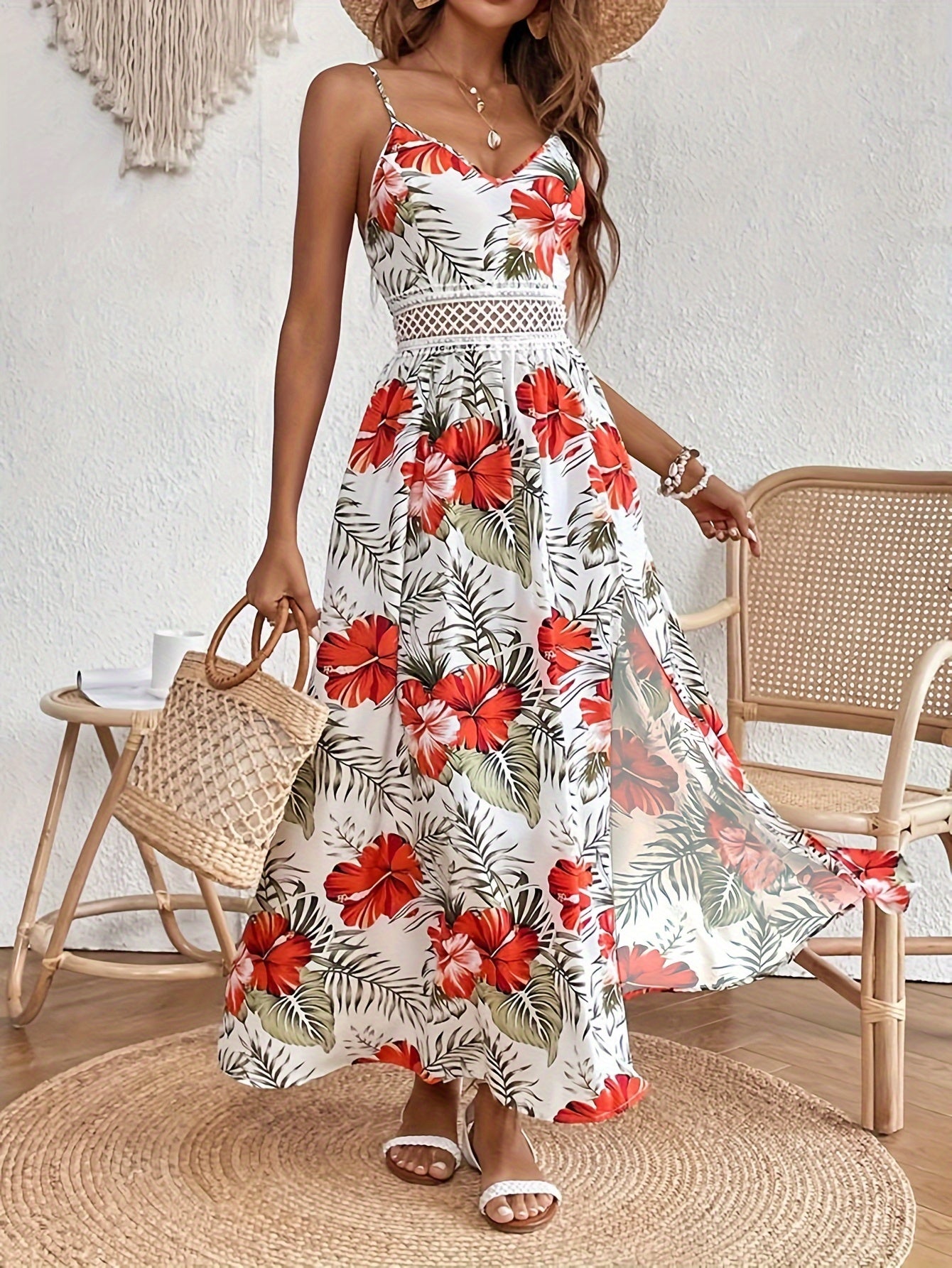 Elegantes Blumenkleid mit Spaghettiträgern und Schlitz